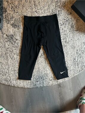 Nike Black Kids 3/4 Athletic Leggings with White Swoosh